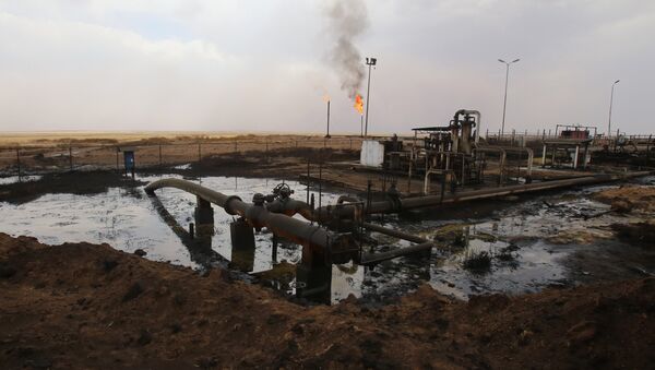 Oil well pumps are seen in the Rmeilane oil field in Syria's northerneastern Hasakeh province on July 15, 2015 - Sputnik Brasil