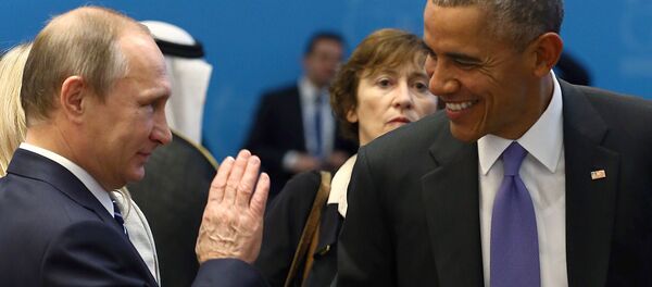 Barack Obama conversa com Vladimir Putin antes de uma sessão de trabalho do G20 - Sputnik Brasil