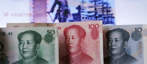 Rublos e yuans - Sputnik Brasil