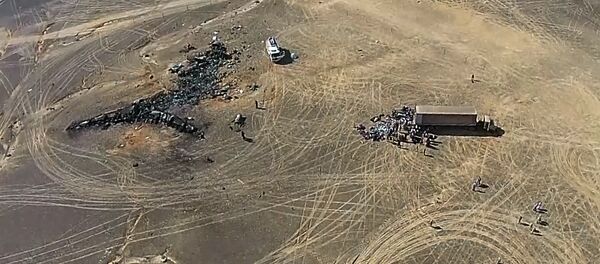 Operação de resgate no local da queda do avião russo - Sputnik Brasil