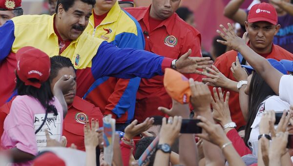 Nicolás Maduro em um evento na Venezuela - Sputnik Brasil