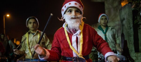 Natal na Síria: Apesar da guerra, há espírito festivo em Damasco. - Sputnik Brasil