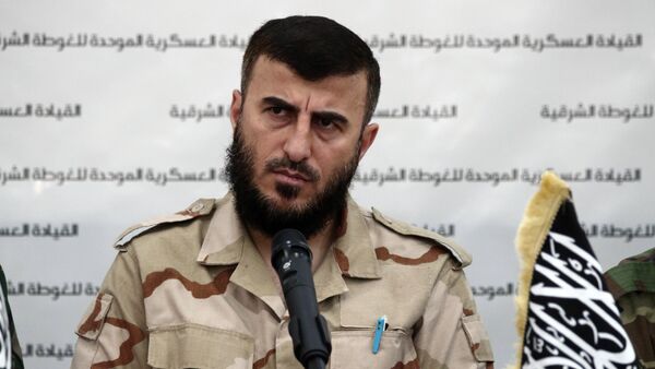 Zahran Alloush, the leader of Jaysh al-Islam (Islam Army) and military leader of the Islamic Front, attends a press conference with other brigade leaders in the rebel-held Eastern Ghouta region outside the capital Damascus on August 27, 2014, to announce the fomation of The Unified Military Command of Eastern Ghouta - Sputnik Brasil