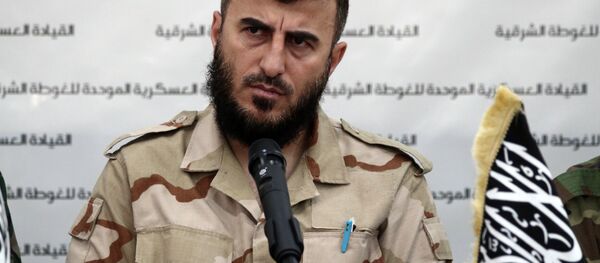 Zahran Alloush, the leader of Jaysh al-Islam (Islam Army) and military leader of the Islamic Front, attends a press conference with other brigade leaders in the rebel-held Eastern Ghouta region outside the capital Damascus on August 27, 2014, to announce the fomation of The Unified Military Command of Eastern Ghouta - Sputnik Brasil