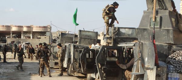 Forças de segurança do Iraque se preparam para avançar ao centro da cidade de Ramadi, Iraque, 24 de dezembro de 2015 - Sputnik Brasil