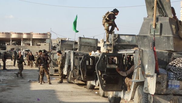 Forças de segurança do Iraque se preparam para avançar ao centro da cidade de Ramadi, Iraque, 24 de dezembro de 2015 - Sputnik Brasil