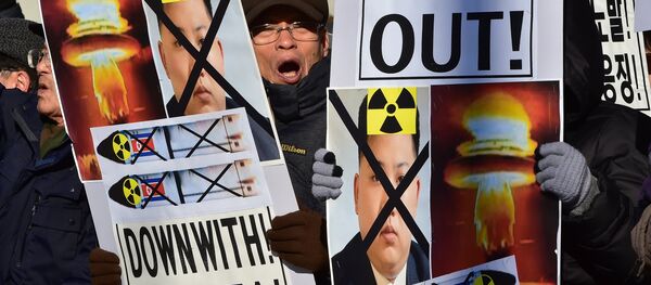 Cidadão sul-coreano participa do protesto contra testes nucleares da Coreia do Norte, 7 de janeio de 2016 - Sputnik Brasil