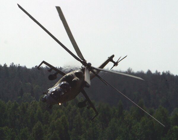 Helicóptero de assalto Mi-24 inspirou tanto os seus desenhadores e operadores que recebeu todo um monte de apelidos, desde ‘Crocodilo’ (Krokodil) e ‘Copo’ (Stakan) a ‘Tanque Voador’ (Letayuschy Tank) Helicóptero de assalto Mi-24 inspirou tanto os seus desenhadores e operadores que recebeu todo um monte de apelidos, desde ‘Crocodilo’ (Krokodil) e ‘Copo’ (Stakan) a ‘Tanque Voador’ (Letayuschy Tank) - Sputnik Brasil