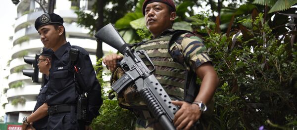 Polícia malaia - Sputnik Brasil