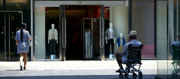 Uma pessoa em cadeira de rodas - Sputnik Brasil