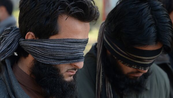Duas pessoas acusadas de militar nas fileiras do Daesh foram apresentadas à mídia em 20 de janeiro pela polícia da cidade de Jalalabad, na província afegã de Nangarhar - Sputnik Brasil