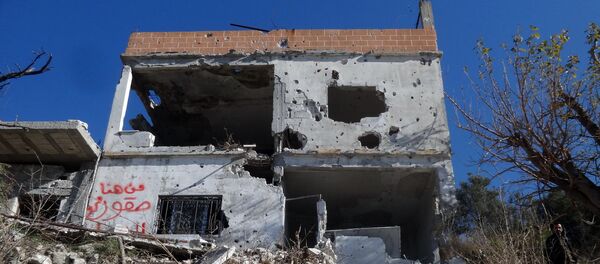 Ruinas de um prédio na cidade de Salma, libertada do Daesh - Sputnik Brasil