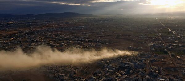Daraya, um subúrbio de Damasco, durante combates entre o Exército Árabe sírio e terroristas Daraya, um subúrbio de Damasco, durante combates entre o Exército Árabe sírio e terroristas - Sputnik Brasil