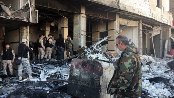 Cenário de destruição após ataque terrorista no distrito xiita de Sayyidah Zaynab, em Damasco (arquivo) - Sputnik Brasil