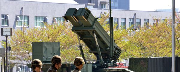 Soldados da Força de Autodefesa do Japão perto do sistema de defesa antimíssil Patriot, Tóquio, Japão - Sputnik Brasil