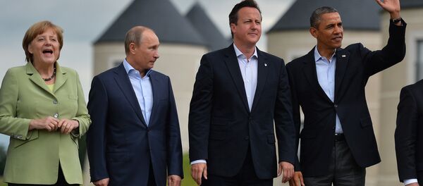 Líderes do G8: a chanceler alemã Angela Merkel, presidente russo Vladimir Putin, primeiro-ministro britânico David Cameron e presdiente norte-americano Barack Obama depois da cúpula do grupo em Lough Erne, Irlanda do Norte, 18 de junho de 2014 - Sputnik Brasil