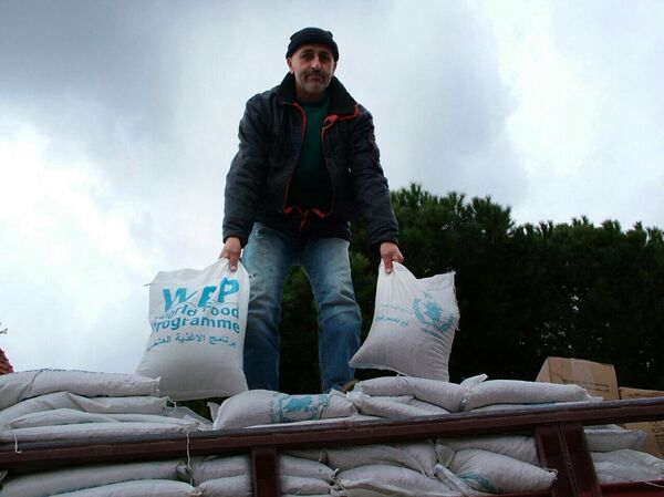 Ajuda humanitária russa chegou à cidade de Kessab, na província síria de Latakia - Sputnik Brasil