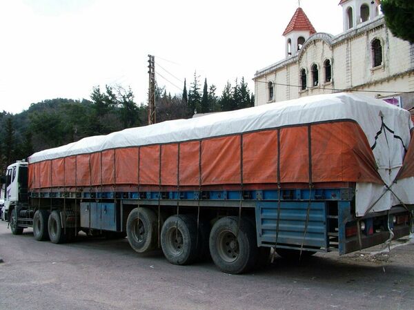 Caminhão que transportou a ajuda humanitária russa à cidade de Kessab - Sputnik Brasil