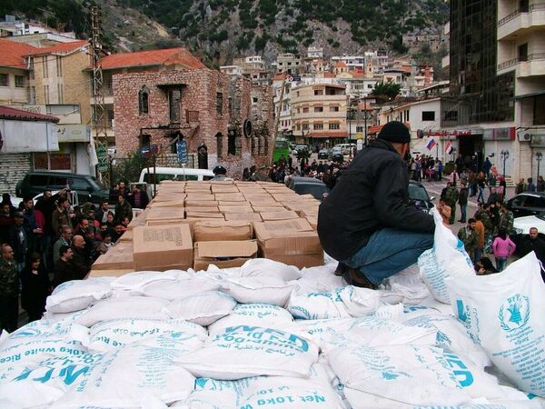 Ajuda humanitária russa é preparada para ser distribuída em Kessab, na província síria de Latakia - Sputnik Brasil