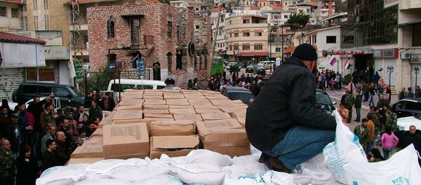 Ajuda humanitária russa é preparada para ser distribuída em Kessab, na província síria de Latakia - Sputnik Brasil