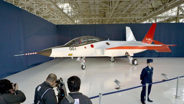 A prototype of the first Japan-made stealth fighter is pictured at a Mitsubishi Heavy Industries' factory in Toyoyama town, Aichi Prefecture, central Japan, in this photo taken by Kyodo January 28, 2016 - Sputnik Brasil