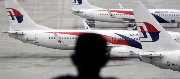 Aviões da Malaysia Airlines no aeroporto internacional de Kuala Lumpur em Malásia - Sputnik Brasil