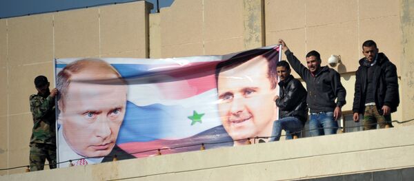 Estudantes em Homs realizam manifestação em favor da operação militar russa na Síria Estudantes em Homs realizam manifestação em favor da operação militar russa na Síria - Sputnik Brasil