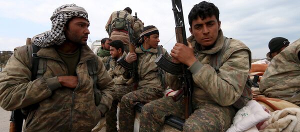 Soldados das Unidades de Proteção Popular (YPG) - Sputnik Brasil