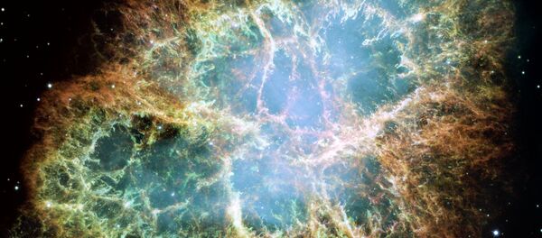 Uma imagem de Crab Nebula (que é restos expandidos de uma supernova) tirada pelo telescópio Hubble. - Sputnik Brasil