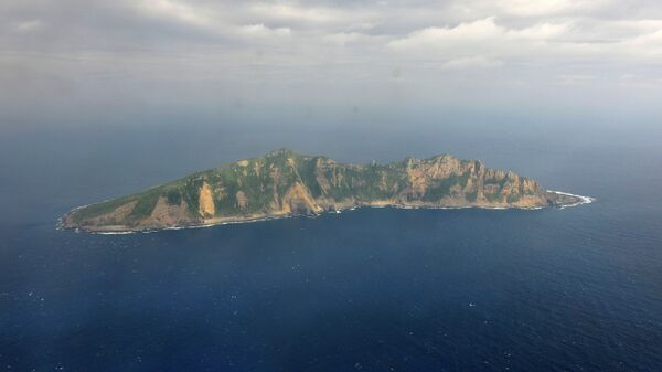 Uma das ilhas pequenas no mar da China Oriental conhecido como Senkaku no Japão e Diaoyu na China (foto de arquivo) - Sputnik Brasil