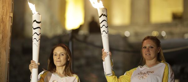 Revezamento da tocha olímpica Revezamento da tocha olímpica - Sputnik Brasil