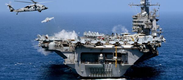 USS John C. Stennis (CVN-74), um super-porta-aviões de propulsão nuclear norte-americano da classe Nimitz USS John C. Stennis (CVN-74), um super-porta-aviões de propulsão nuclear norte-americano da classe Nimitz - Sputnik Brasil