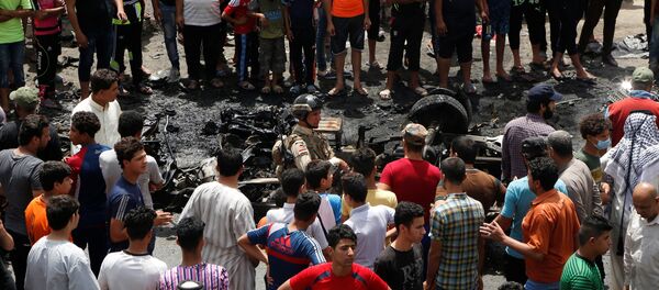 Local de explosão de carro em Bagdá - Sputnik Brasil