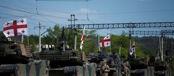 M1A2 Abrams nos exercícios conjuntos dos EUA e Geórgia em 5 d emaio, 2016 M1A2 Abrams nos exercícios conjuntos dos EUA e Geórgia em 5 d emaio, 2016 - Sputnik Brasil