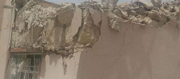 Inferno no Iraque: prédios destruídos por foguetes Jhannam, de fabrico terrorista, na cidade de el-Khaldiya, na província de Anbar, em 16 de maio de 2016 Inferno no Iraque: prédios destruídos por foguetes Jhannam, de fabrico terrorista, na cidade de el-Khaldiya, na província de Anbar, em 16 de maio de 2016 - Sputnik Brasil