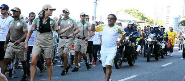 Patrulhamento reforçado durante o revezamento da Tocha Olímpica Patrulhamento reforçado durante o revezamento da Tocha Olímpica - Sputnik Brasil