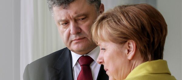 Ukrainian President Petro Poroshenko meets with German Chancellor Angela Merkel - Sputnik Brasil