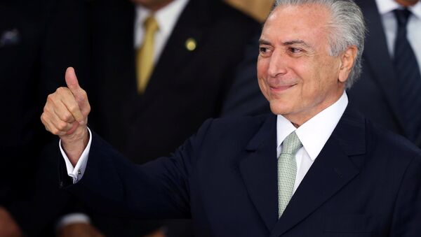 Brazil's interim President Michel Temer gestures during a ceremony where he made his first public remarks after the Brazilian Senate voted to impeach President Dilma Rousseff at the Planalto Palace in Brasilia, Brazil, May 12, 2016 - Sputnik Brasil