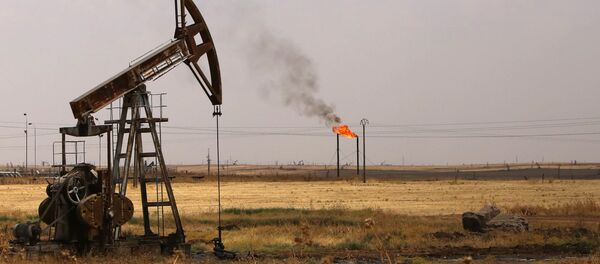 Poço de petróleo no campo Rmeilane, província de Hasakeh, Síria, julho de 2015 (foto de arquivo) - Sputnik Brasil