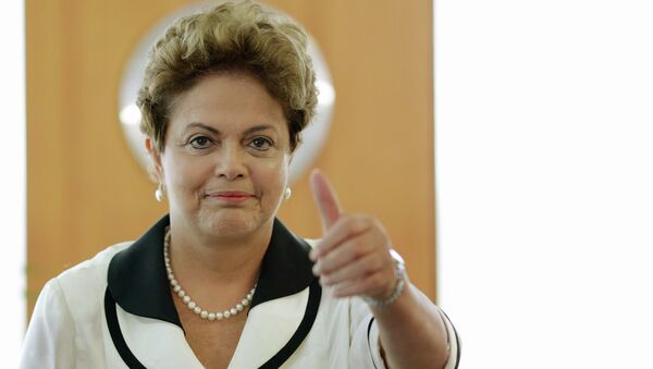 Brazil's President Dilma Rousseff gestures during a meeting with German Foreign Minister Frank-Walter Steinmeier at the Planalto Palace in Brasilia February 13, 2015. - Sputnik Brasil