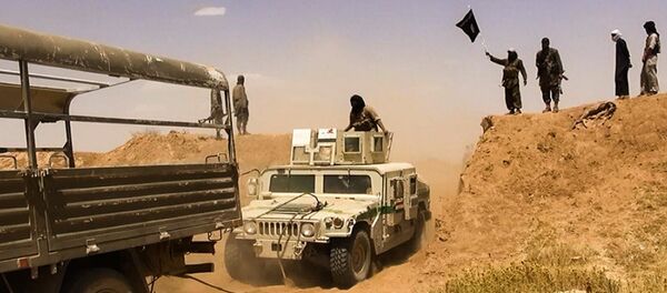 Militantes do Daesh na fronteira Síria-Iraque (arquivo) - Sputnik Brasil