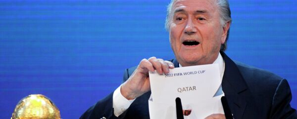 O presidente da FIFA, Sepp Blatter, anunciando a sede do Mundial de 2022 - Sputnik Brasil