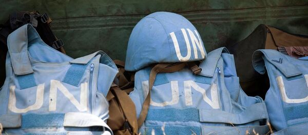 Capacetes das forças de manutenção da paz das Nações Unidas Capacetes das forças de manutenção da paz das Nações Unidas - Sputnik Brasil
