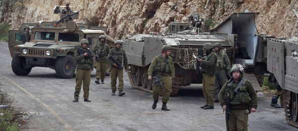 Soldados israelenses patrulhando na fronteira do país - Sputnik Brasil