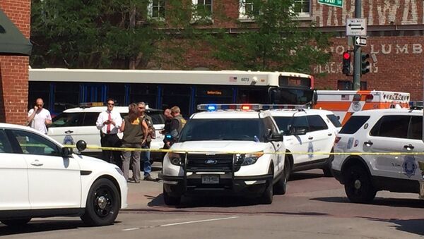 Police vehicles sit at 15th and Wynkoop, after an active shooter was reported and police secured the scene, in Denver, Colorado, U.S. June 28, 2016 - Sputnik Brasil