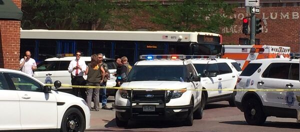 Police vehicles sit at 15th and Wynkoop, after an active shooter was reported and police secured the scene, in Denver, Colorado, U.S. June 28, 2016 - Sputnik Brasil