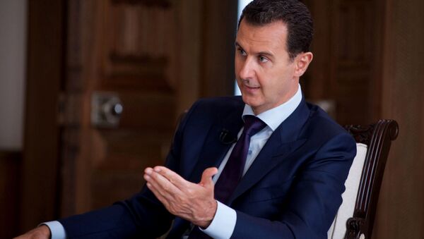 Presidente sírio, Bashar Assad fala durante uma entrevista com o canal de notícias SBS da Austrália, em Damasco, Síria. 01 de julho, 2016 - Sputnik Brasil