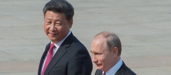 Presidente chinês Xi Jinping e o presidente russo Vladimir Putin durante a sua visita oficial à China, Pequim, China, 25 de junho de 2016 Presidente chinês Xi Jinping e o presidente russo Vladimir Putin durante a sua visita oficial à China, Pequim, China, 25 de junho de 2016 - Sputnik Brasil