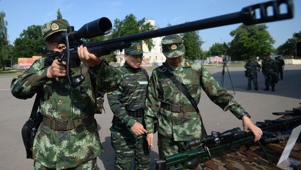 Inauguração dos exercícios táticos conjuntos das forças especiais da Guarda Nacional da Rússia e da Polícia Armada do Povo da China (PAP) Cooperação-2016 - Sputnik Brasil