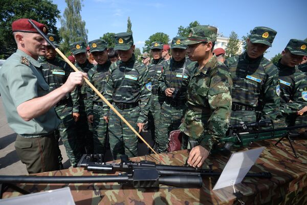 Inauguração dos exercícios táticos conjuntos das forças especiais da Guarda Nacional russa e da Polícia Armada do Povo chinesa (PAP) “Cooperação-2016” - Sputnik Brasil